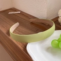 Light green floral checkered fabric headband displayed on a white plate with grapes - Matcha Green
