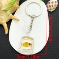 Realistic orange goldfish in water bag keychain with silver chain, size 8.7cm by 3cm - Keychain / Yellow Fish Keychain