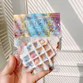 Soft waffle-shaped sensory fidget toy with colorful beads and holographic packaging - Blue Pink White Waffle