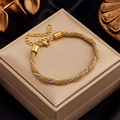 Two-tone gold and silver braided twisted rope bracelet with steel clasp on black velvet - Gold Color (B684)