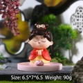 Traditional Chinese girl figurine in red attire, praying pose with pink base, 7cm height - Praying Hands Phone Holder