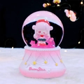 Pink sakura crystal ball with cute girl figurine and DreamStar base for girls' gift - 8014 Pink Base / Medium Size 80 With Snow Lights And Music