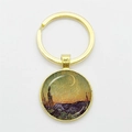 Round golden keychain featuring Van Gogh Starry Night art under a glass dome pendant - Gold-Starry Night G