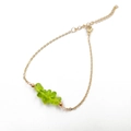 Detail of adjustable gold chain bracelet with irregular olive green crystal stones - Green Crystal