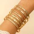 Eight-piece gold bangle set for women with engraved geometric heart and star patterns - 16 KC Gold DZ-666