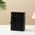 Foldable black gift box with gold-stitched ribbon bow for high-end luxury packaging - Black / 29*21*10.5cm
