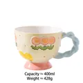 Polka dot ceramic mug with 3D floral relief, light blue handle and pink base 400ml - Three Flowers