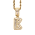 Close-up of hip-hop letter K pendant with baguette and round cut stones on gold rope chain - Letter K Gold + 60cm Rope Chain