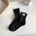 Calze Lolita nere con bordo in pizzo bianco e ricamo a farfalla in vista piatta - Nero con Farfalla Bianca