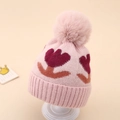Détail du bonnet tricoté rose pour bébé avec pompon et motif de fleurs de tulipes - Taille Unique (0-12 Mois) / Rose