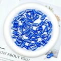Blue fish-shaped ceramic beads with evil eye design for DIY jewelry making - Medium Royal Blue