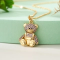Collana con pendente orsetto placcato oro 18K con zirconi viola su base verde - Oro - Zircone Viola