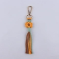 Handgeknüpfter Blumen-Schlüsselanhänger, bunte Baumwollkordel Taschen-Anhänger Boho. - Orange