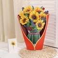Macro detail of 3D popup sunflower bouquet greeting card with vase and matching small note - Large Sunflowers