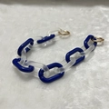 Detail of blue and frosted white acrylic chunky chain with gold metal round clips - Frosted Dark Blue