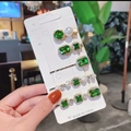 Detailed set of 5 vintage gold hair clips with emerald rhinestones and pearls on a card - Emerald Green Gold 5-Piece Set