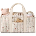 Nahaufnahme der gesteppten Windeltasche mit Blumenmuster und großen Fächern für Babysachen - 38.1*25.4*17.8cm / Blumenbeige