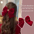 Detail of red velvet bow hair clip with gold chain buckle and 8.2cm metal spring clip - 8# Chain Bow Spring Clip - Red