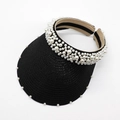 Detail view of black woven sun visor with elegant white pearl beads on edge and band - Black