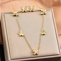 Parure bijoux papillon dorée avec incrustations en nacre, collier et boucles d'oreilles - Set de 2 pièces
