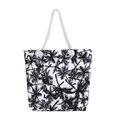 White canvas tote bag featuring a black palm tree print and white braided rope handles - B&W Palm Leaves
