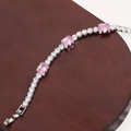 Silver tennis bracelet featuring sparkling zircons and rectangular pink gemstones - White Gold Plated Pink Zirconia
