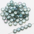 Macro shot of 10mm iridescent blue glass rose beads with spiral texture for DIY jewelry - Transparent Green