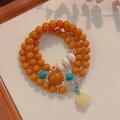 Vintage orange agate prayer beads bracelet with turquoise accents and ruyi charm - Three Circles Imitation Amber: Rose Bracelet