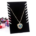 Golden heart necklace with deep blue crystal and colorful rhinestones on black display - 8-Position Thin Necklace Board