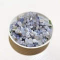 Polished natural blue chalcedony crystal stones in a white ceramic bowl for DIY decor - Blue Chalcedony