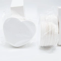 Compressed heart shaped white cellulose facial cleansing sponge in clear plastic packaging - White Heart 70x60x8mm 50 Pcs