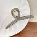 Elegant dark grey translucent matte hair claw clip with golden metal spring on a tray - 11cm / Gray