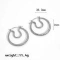 Detail showing geometric irregular twisted line earrings with 35.3mm diameter dimensions - Silver Irregular Double Hoop Earrings (TE60179-S)