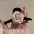 Elegant black velvet hair claw clip with a beige camellia flower detail - Camellia Black Cross Style