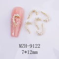 Detailed view of C-shaped nail art charms with white pearls and gold metal base - Gold Base Faux Pearl Left Style (MZH-9122)