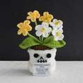 Handcrafted crochet skull pot with yellow and white flowers and emotional support card - Halloween Forget-Me-Not Gradient Yellow