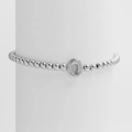 Polished silver beaded stretch bracelet featuring a minimalist letter O balloon charm - Silver O
