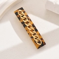 Fermaglio in acetato con motivo tartarugato e decorazione a catena dorata moda - Oro