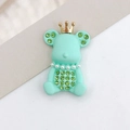 Detail of mint green bear charm with golden crown, pearls and green rhinestones - Light Green