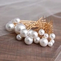 Close-up of pearl U-shaped hair pins set with elegant lustrous white pearls for bridal hair - Gradient Multi-size Pearl Style (FZ-001) / 18 Pcs/Set / KC Gold