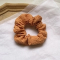 Elegant orange pleated satin scrunchie with soft ribbon texture for a balletcore style - Orange Cream Scrunchie