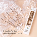 Golden spiral birthday candles in a pack of six, each measuring 15.5cm for elegant cakes - Curly Candle Champagne Gold