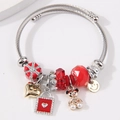 Adjustable stainless steel charm bracelet with red crystal, golden bear and heart charms - Red