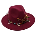 Detail of burgundy wool fedora with colorful beads and natural shell on woven band - Burgundy