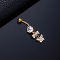 Golden butterfly belly button ring with sparkling cubic zirconia tassels and charms - Bowtie Butterfly Gold