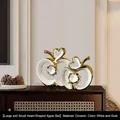 Modern white and gold ceramic apple ornaments with hollow heart design and gold plating - White Gold Heart Apple Pair