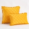 Yellow velvet throw pillow with diamond lattice patterns and pom-pom trim accents - Orange & Yellow