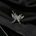 Detailed macro view of irregular silver butterfly ring with molten metal texture on silk - Adjustable Open / Molten Texture Irregular Butterfly (JZ4415)