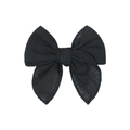 Detailed close-up of a handmade black cotton linen fabric bow hair clip for children - Black