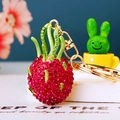 Dragon fruit car keychain with pink and green rhinestones and a gold lobster clasp - Single OPP Bag Packaging / Full Rhinestone Dragon Fruit